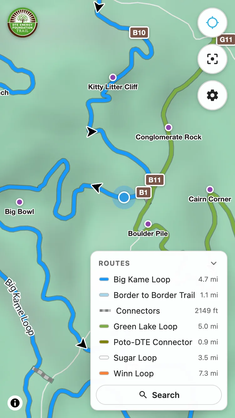 A trailmaps.app map open on a phone at DTE Energy Foundation Trail, with the route key open listing each loop and its distance